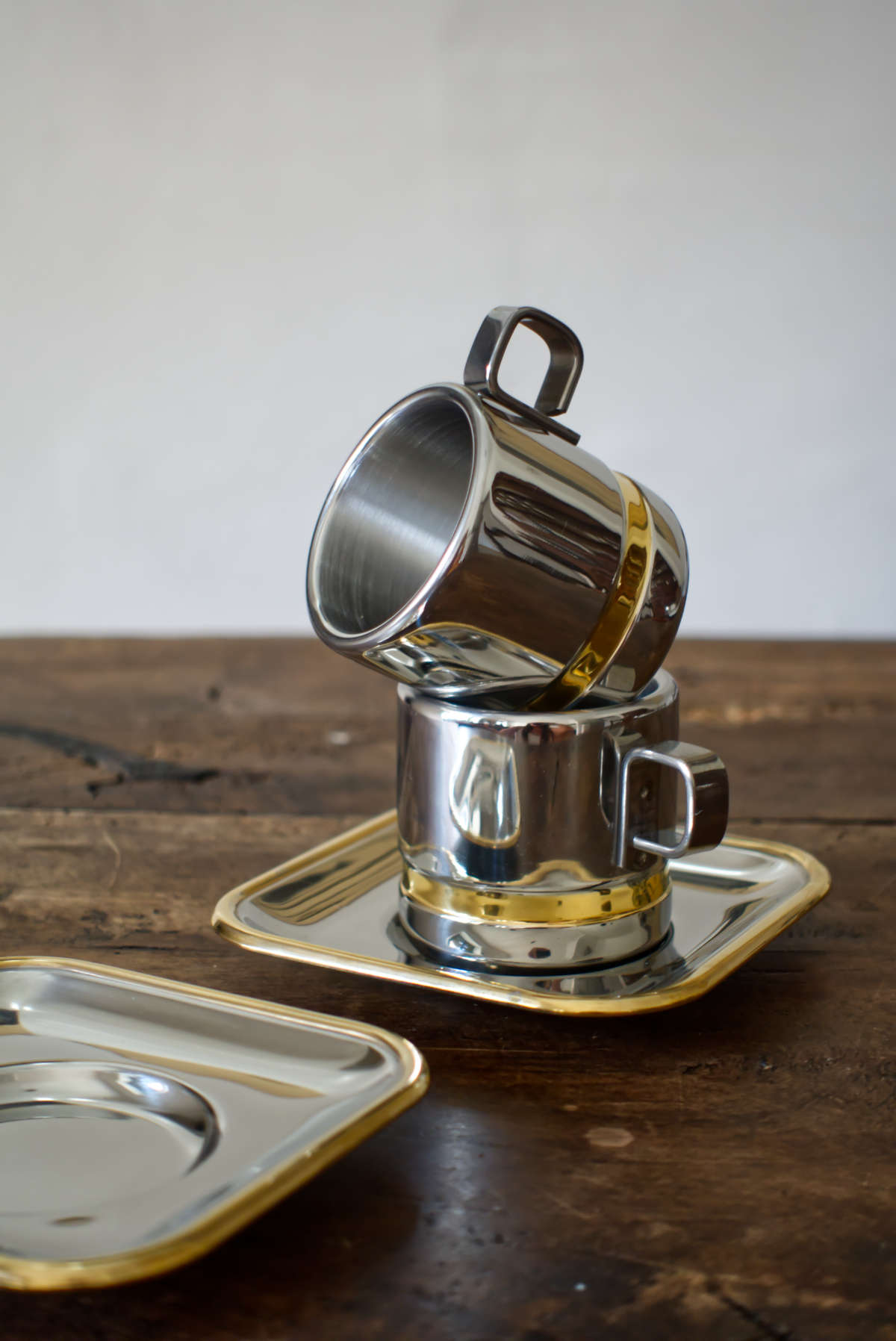 A pair of elegant zini-style espresso cups, a centerpiece for a tranquil morning ritual. These are timeless Mediterranean design pieces that elevate a daily moment into a quiet luxury experience.