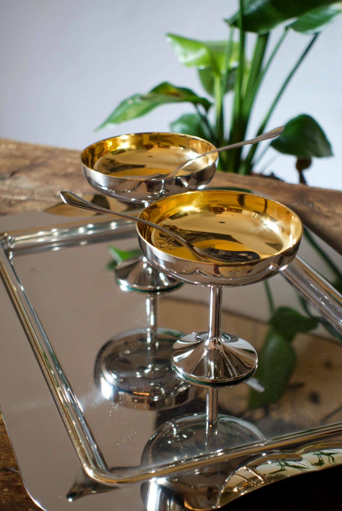 Medieval-inspired Castlecore interior trend with chalice-style coupes and trays