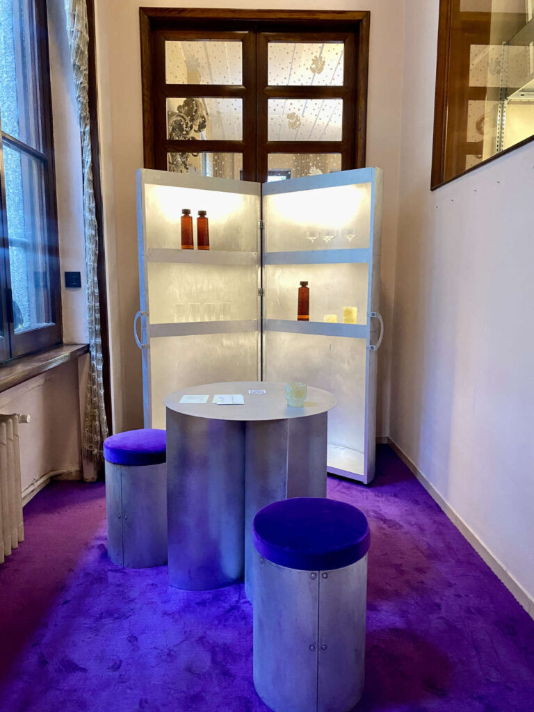 Studio Musa Nova Bar aluminum bar cabinet and stools at Alcova Milan Design Week 2025.